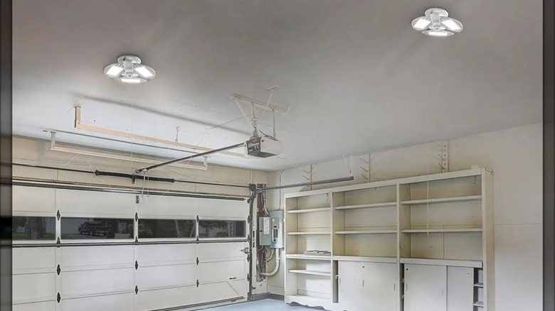 Two Braun 8,000-lumen Motion Sensor Shop Lights installed in a garage