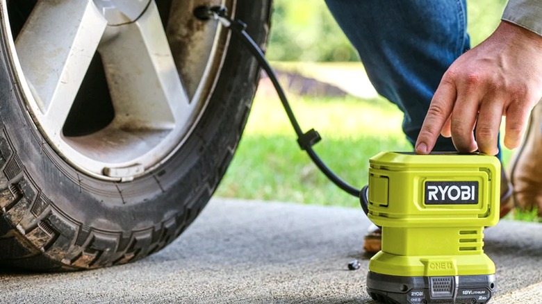 Person using digital inflator