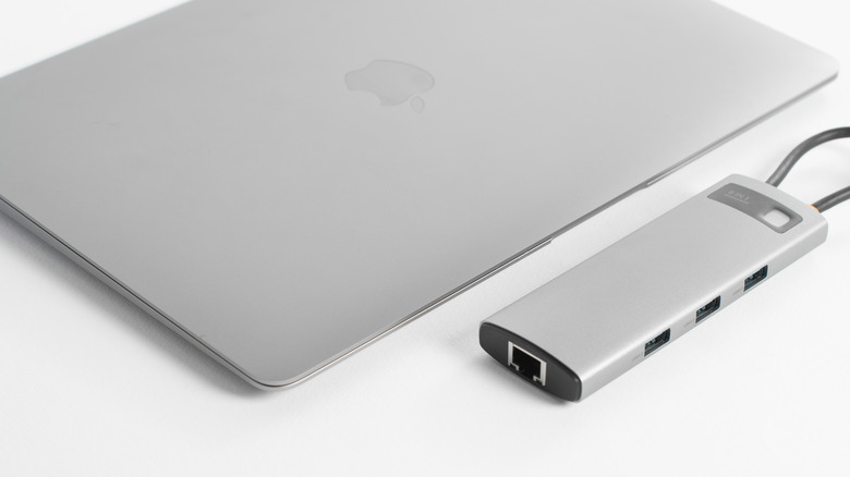 Closed MacBook connected to USB-C hub