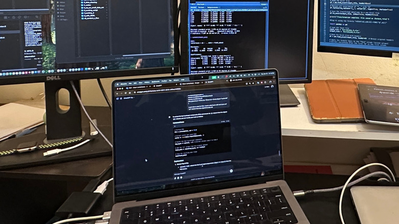 MacBook connected to multiple monitors