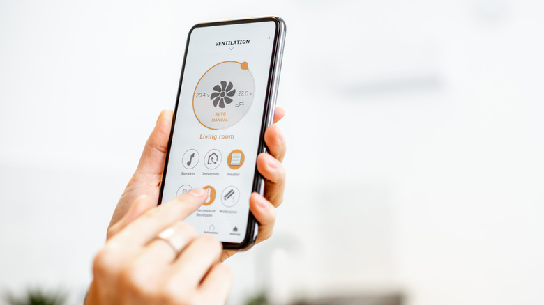 A smartphone controlling a fan