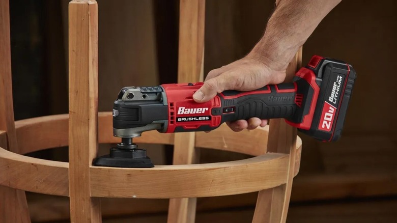 Person using Bauer 20V Multi-tool