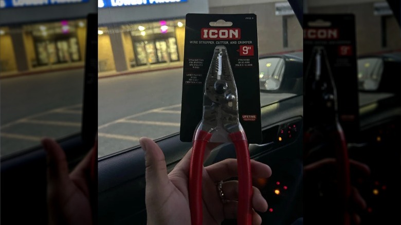 Hands holding up new Icon wire strippers