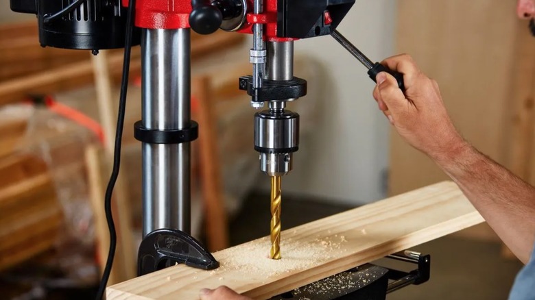 Person using Bauer Drill Press