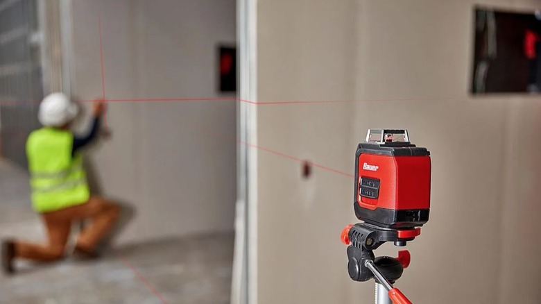 Person using Bauer Laser Level