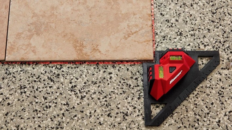 Bauer Flooring Laser Level aligning floor tiles