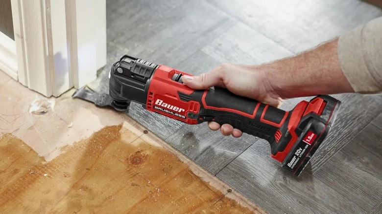 A person using a Bauer multi-tool.