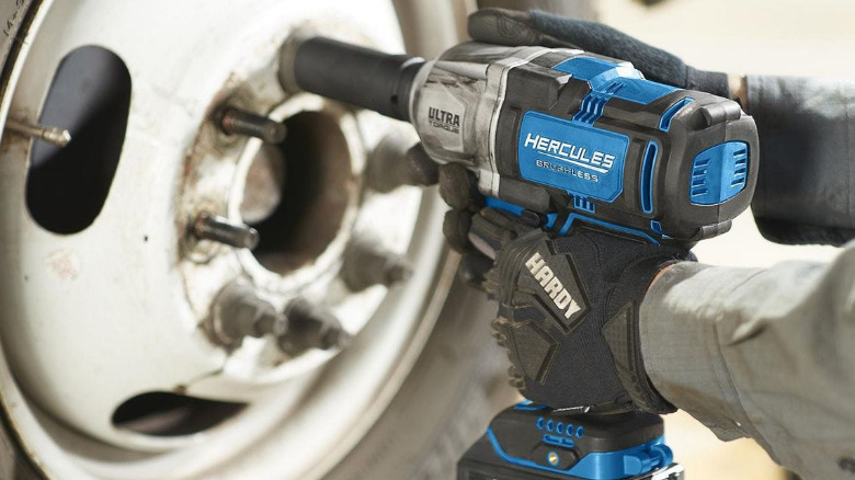 A Hercules Impact Wrench used on a car wheel.