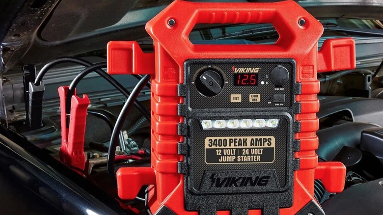 Viking jump starter giving power to a car battery