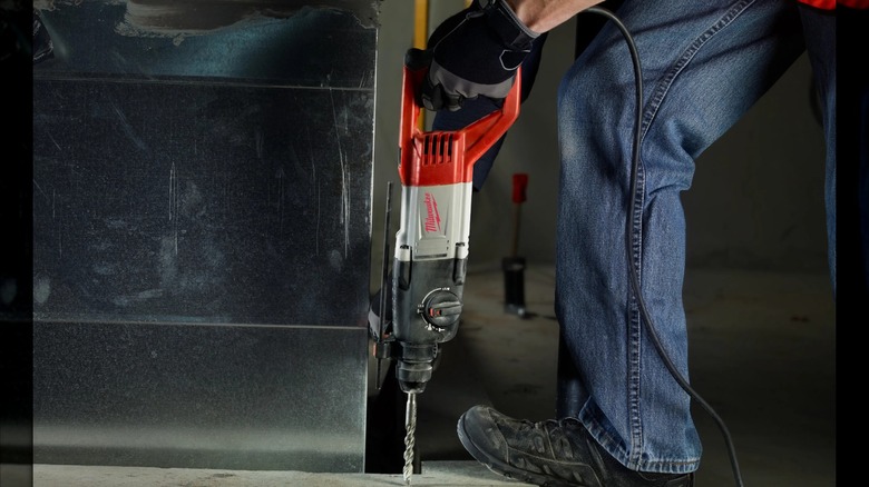 Milwaukee 8-amp 1-inch SDS D-Handle Rotary Hammer in use