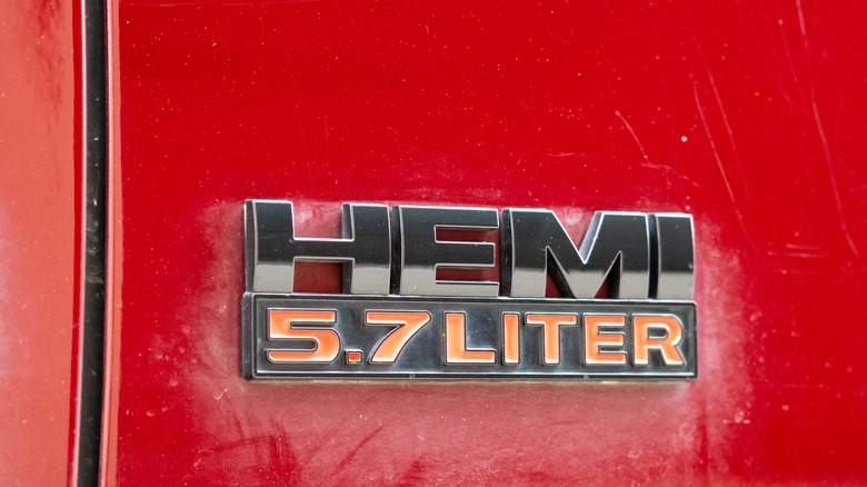 "HEMI 5.7 Liter" badge on red vehicle