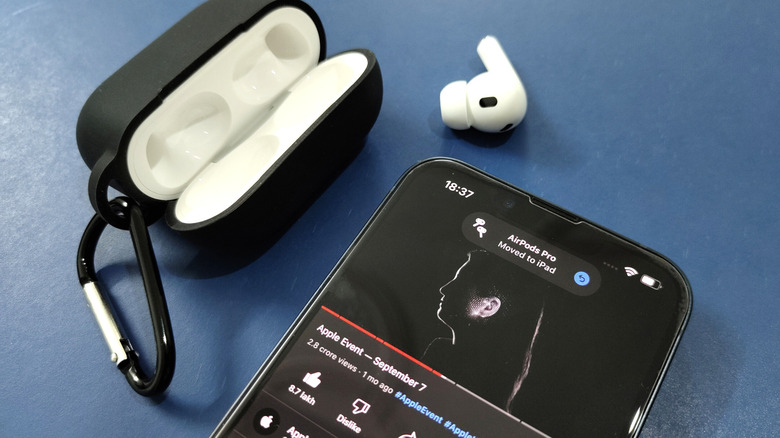 iPhone along with AirPods Pro
