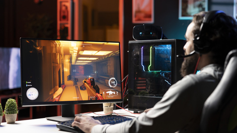 Person gaming on a desktop