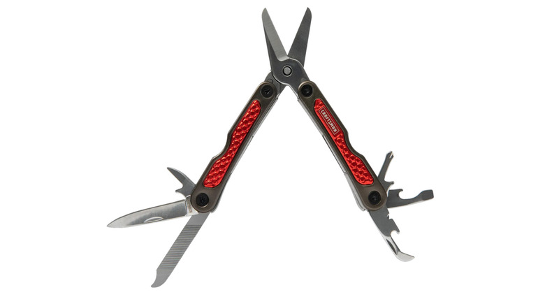 A red and black Craftsman multi-tool with tools exposed on a white background