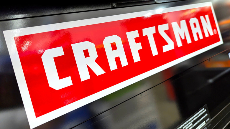 The Craftsman logo painted on a black surface.