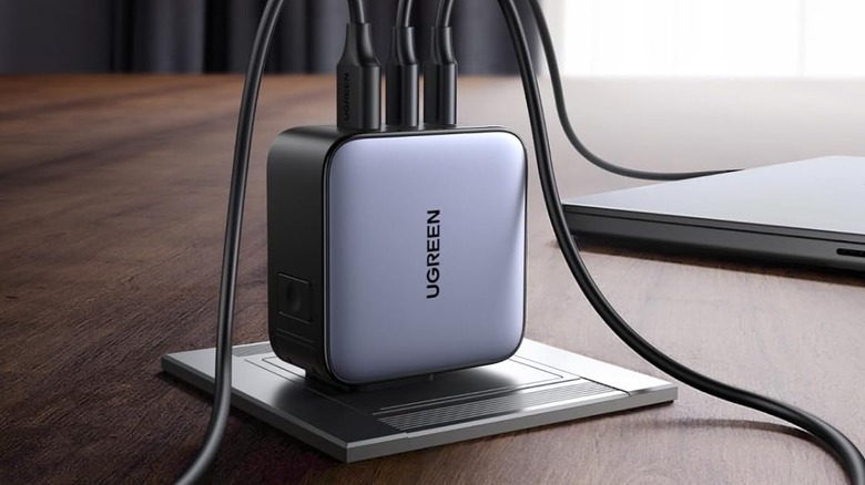 UGREEN travel charger on table with cables