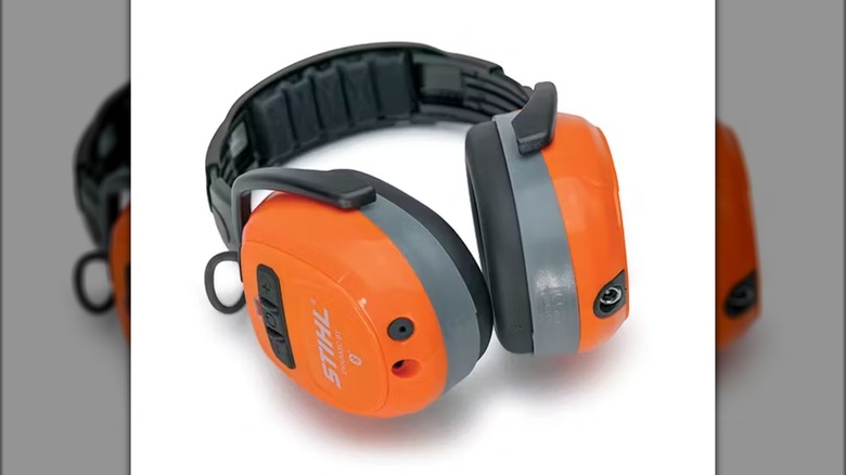 A close-up of STIHL Dynamic Bluetooth hearing protection earmuffs with padded ear cups and an adjustable headband.