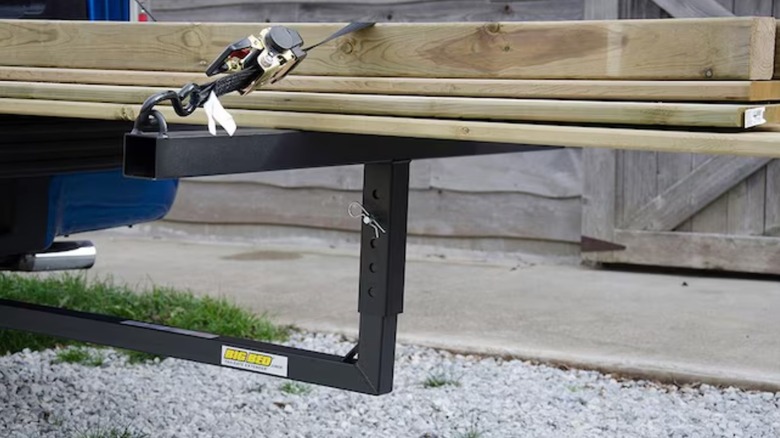 Hitch cargo basket holding wood