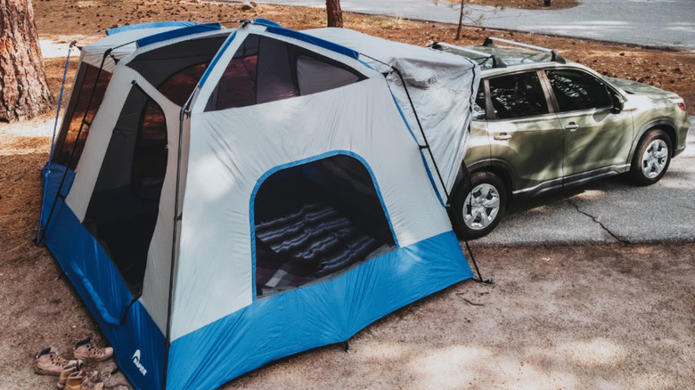 Tent attached to trunk of SUV