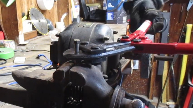 Pittsburgh bolt cutters being used on bolt
