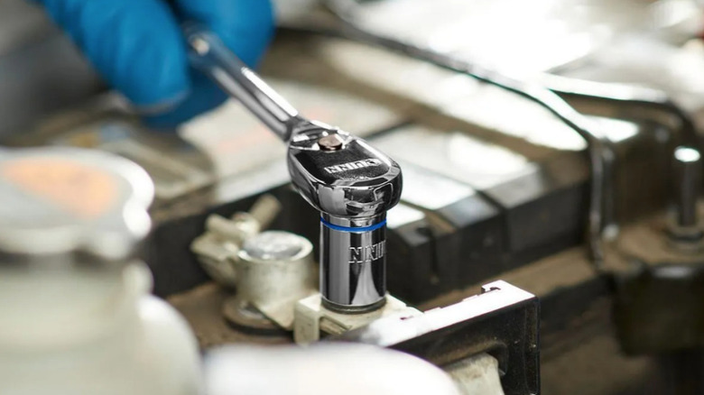 Quinn socket wrench in action close-up