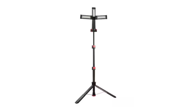 Person using Husky Tripod light in their garage