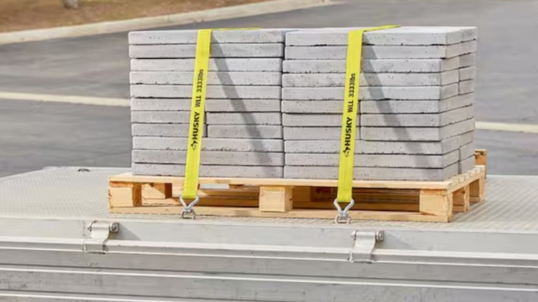 husky ratchet straps holding down cement blocks