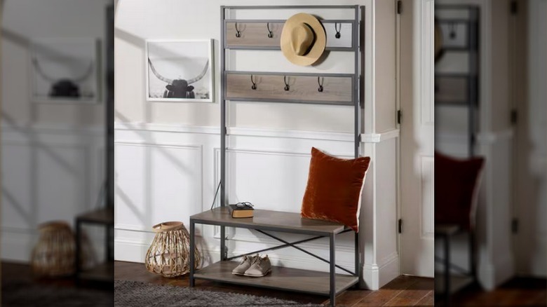 Walker Edison Furniture Company Rustic Industrial Wood Hall Tree Bench against the wall in a home
