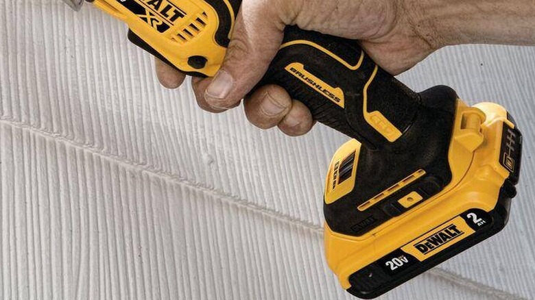 DeWalt 20V Max 2Ah battery attached to a multi-tool