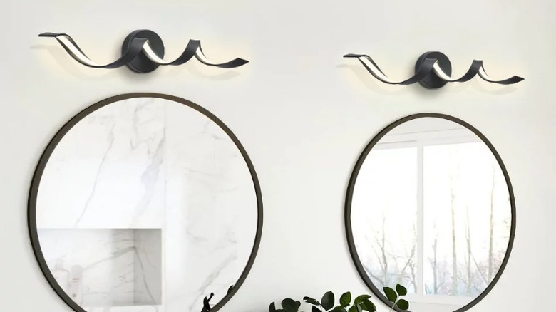 Two LLHZSY Modern Spiral Design LED Bathroom Vanity Lights over round mirrors