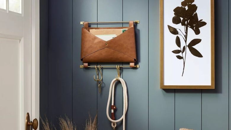 Threshold Entryway Organizer on wall holding mail keys and leash