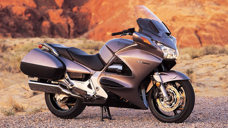 Honda ST1300 in the desert, parked and resting on its kickstand