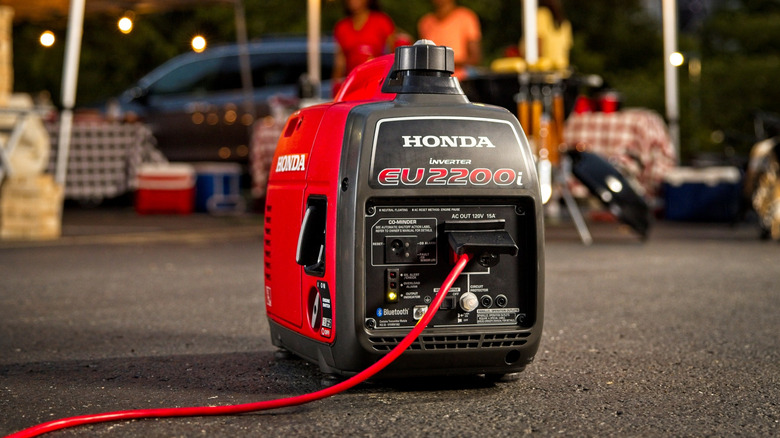 Honda EU2200i generator in use at an event.
