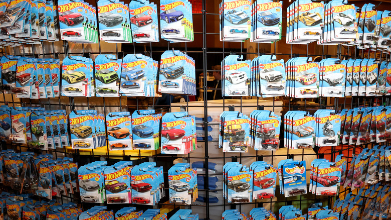 dozens hot wheels toys on display