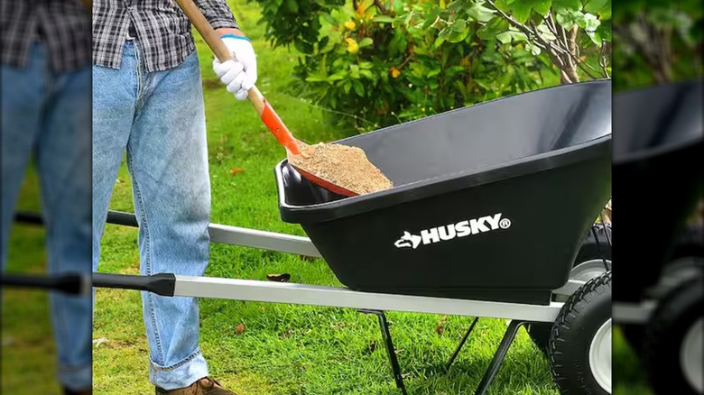 filling a Husky wheelbarrow