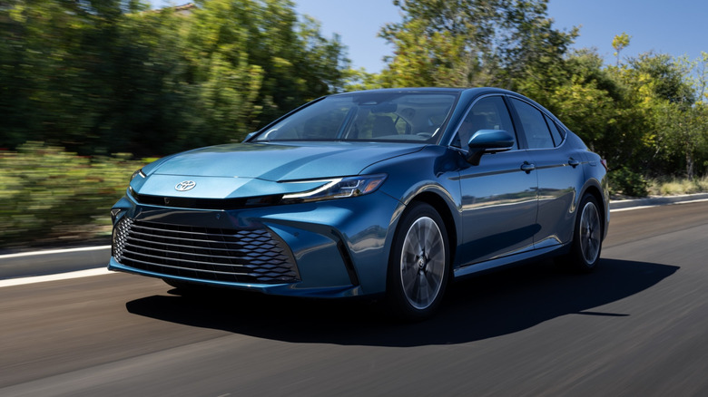 blue 2026 Toyota Camry driving on a street