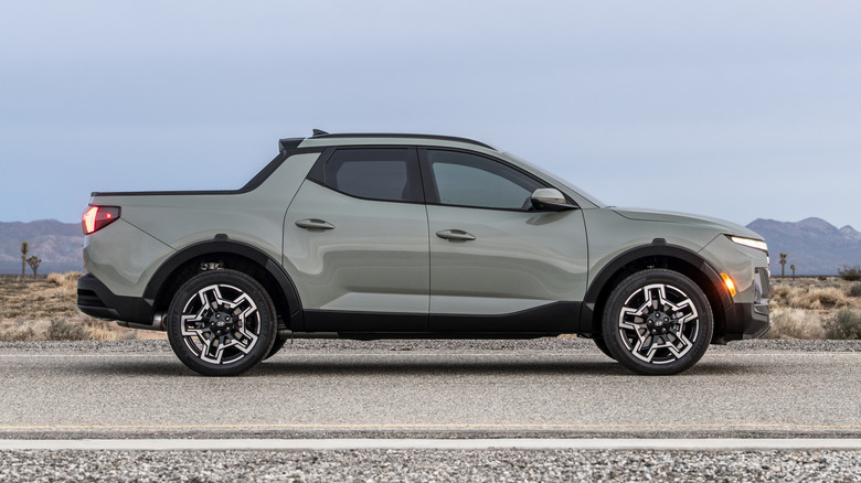 Side view of gray 2026 Hyundai Santa Cruz parked in desert.