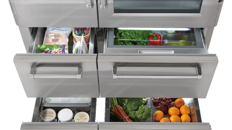 Sub-Zero Pro refrigerator with open drawers.