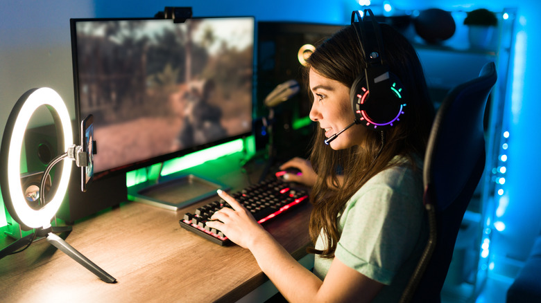 girl livestreaming at her gaming PC