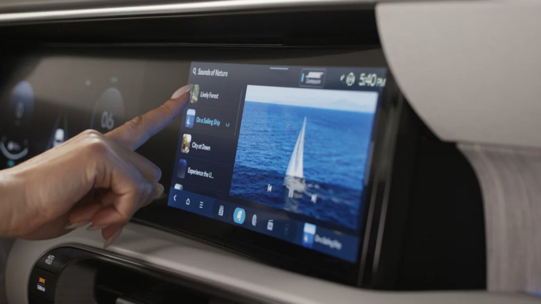 Person using Hyundai infotainment screen