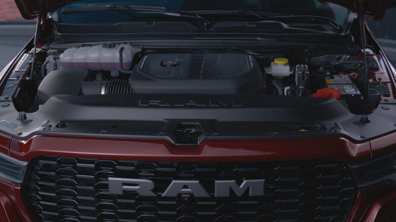 A red Ram pickup truck showcasing its Stellantis Hurricane 3-liter six-cylinder engine.
