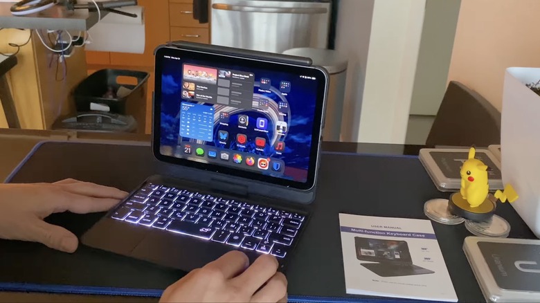 Close up of an ipad mini in a keyboard case.