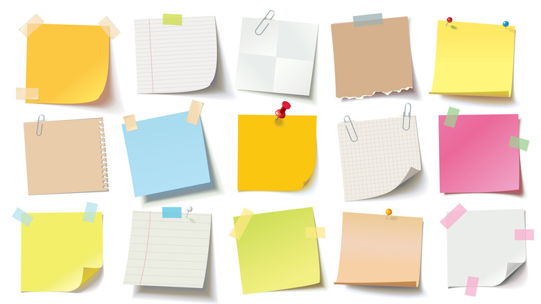 Series of colorful sticky notes on a white background