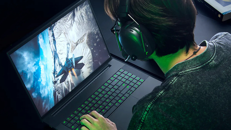 A person gaming on the Razer Blade 18