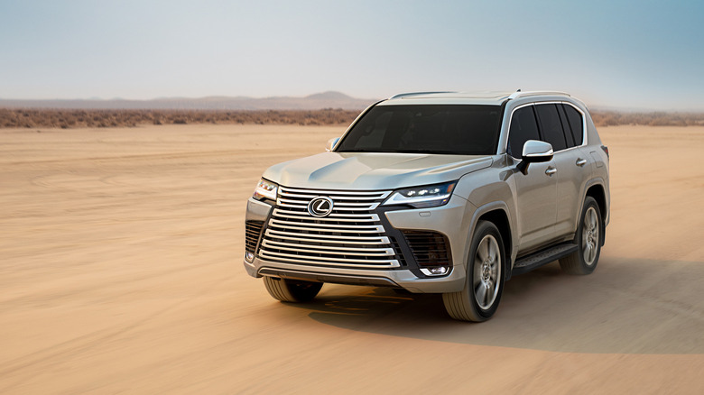 Dynamic shot of a 2024 Lexus LX 600 Ultra Luxury in a desert