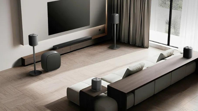 A living room fitted with a complete LG Sound Suite system.