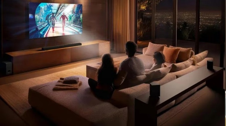 Family watching LG C6 Series OLED Evo AI