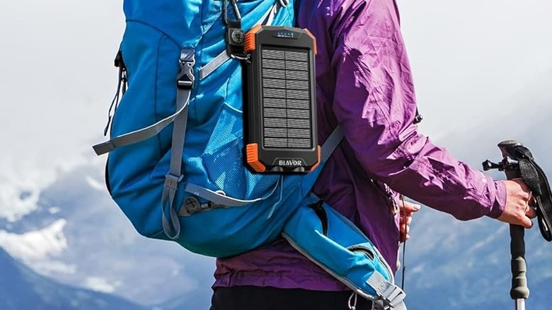 hiker with solar powered power bank