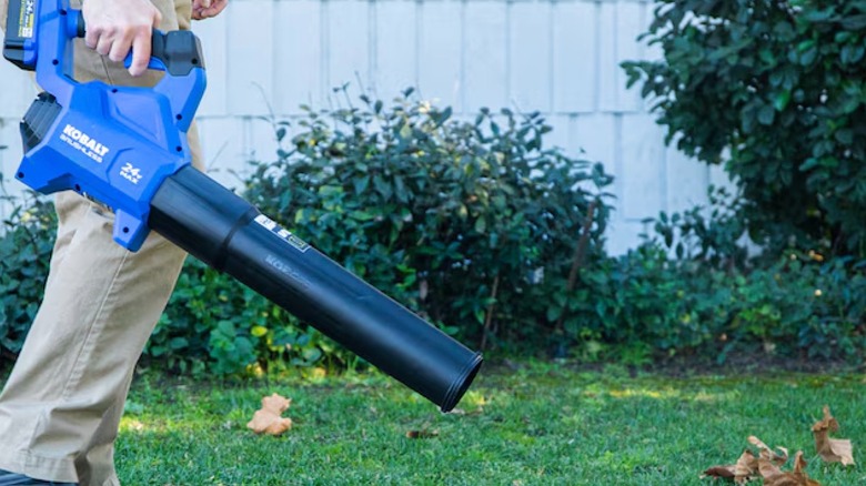 Kobalt 24V 500-CFM 120-MPH Handheld Leaf Blower in use