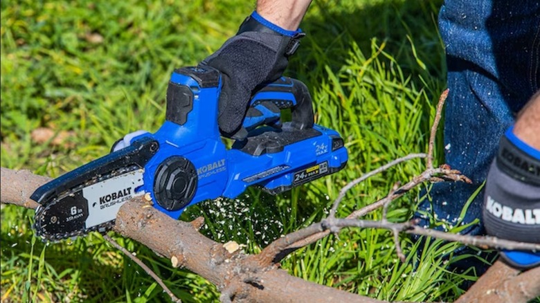 Kobalt 24V 6-inch Pruning Chainsaw in use